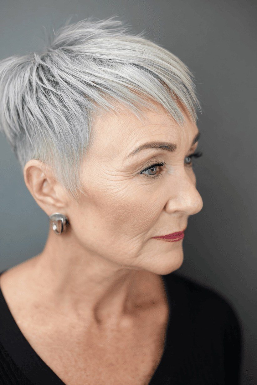 Polished silver pixie haircut for women over 60, three-quarter view