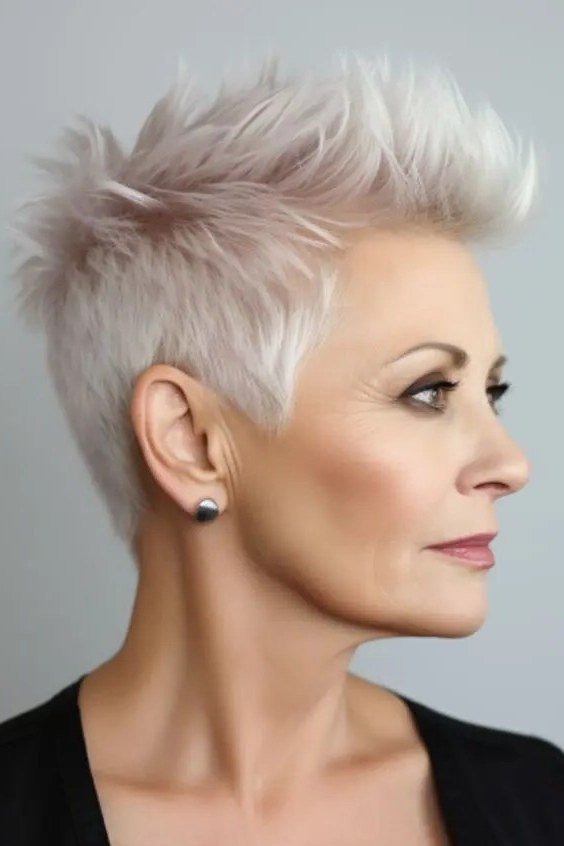 White quiff pixie haircut for women over 60, three-quarter view