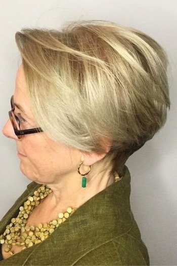 Classic white pixie haircut for women over 60, front view