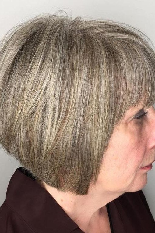 Layered bob haircut for thin fine hair over 50, side view, ash-blonde layered bob