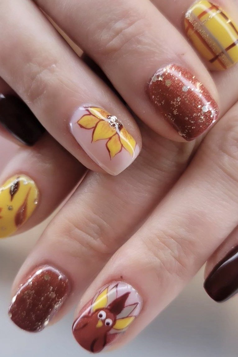 Plaid and glitter burgundy nails with turkey art on short nails