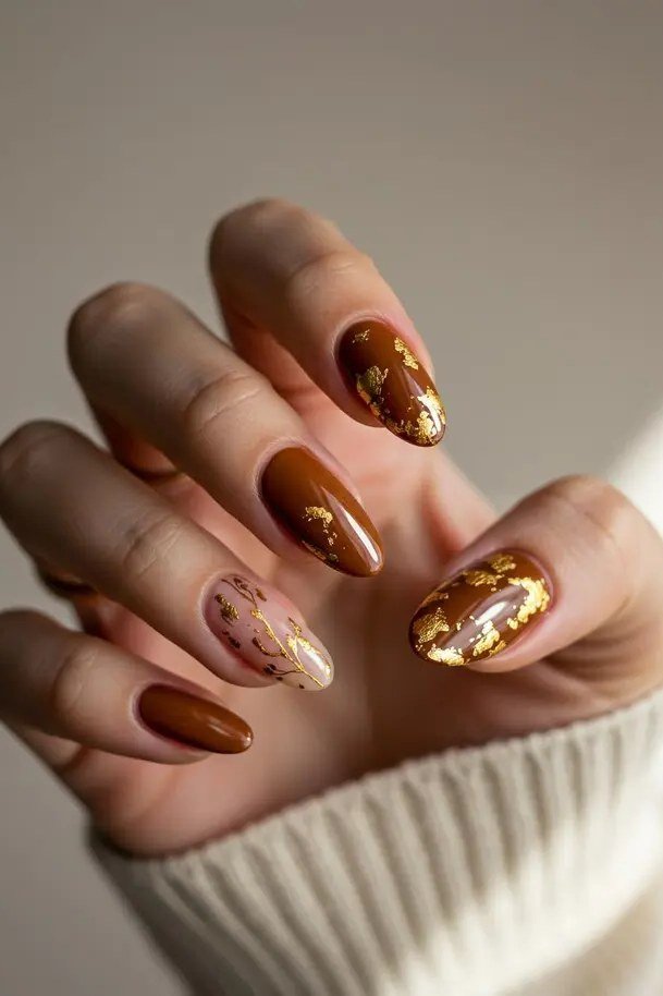 Caramel nails with gold foil accents
