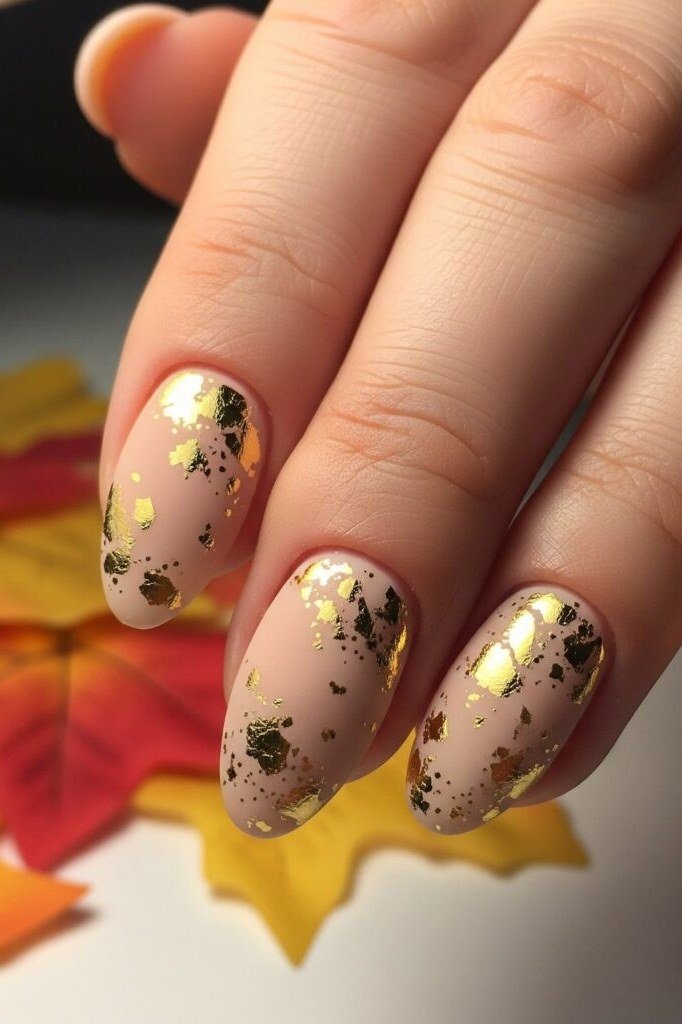 Nude nails with gold foil fall leaves