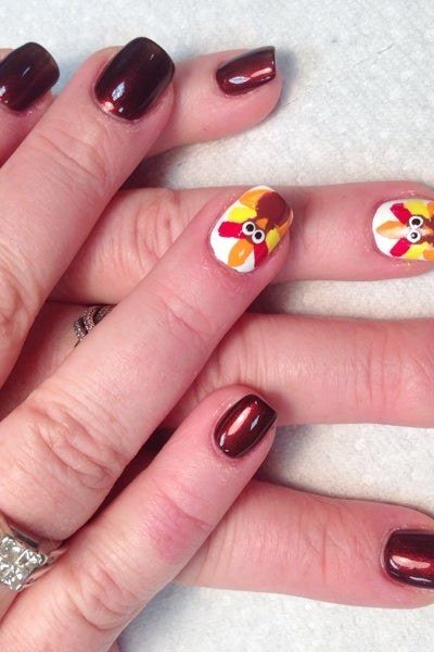 Deep burgundy nails with turkey art accents