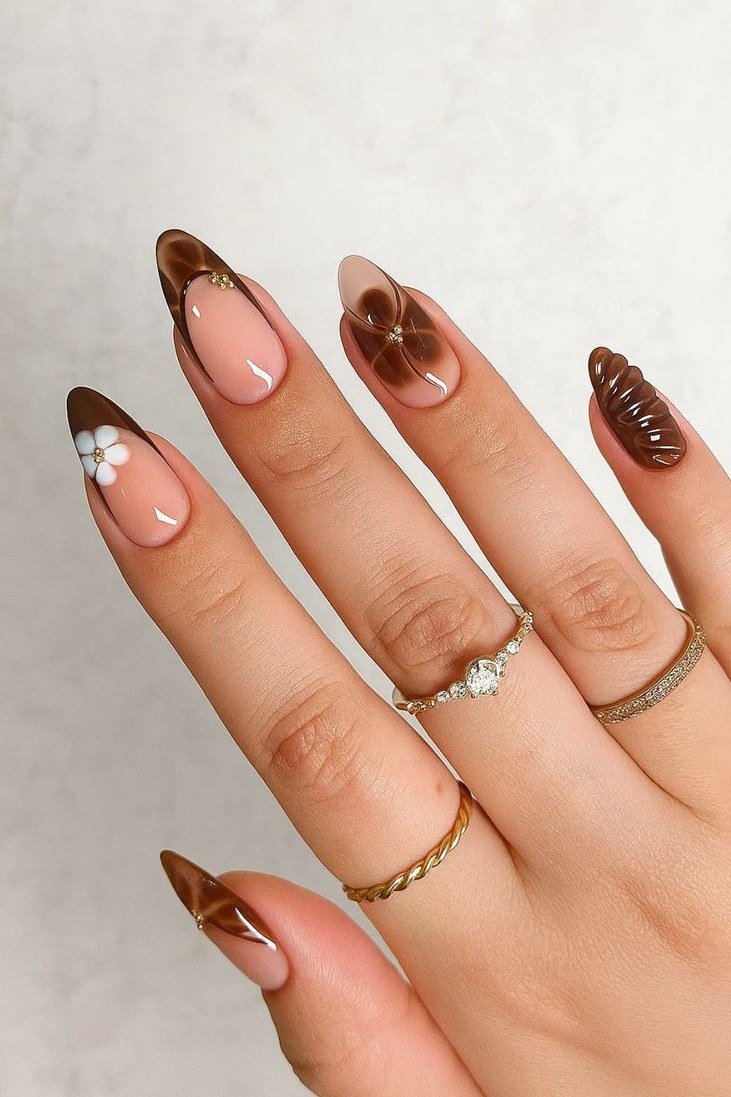 Tortoiseshell nail design: Nude Almond Nails with Tortoise Tips and Daisies for women over 50