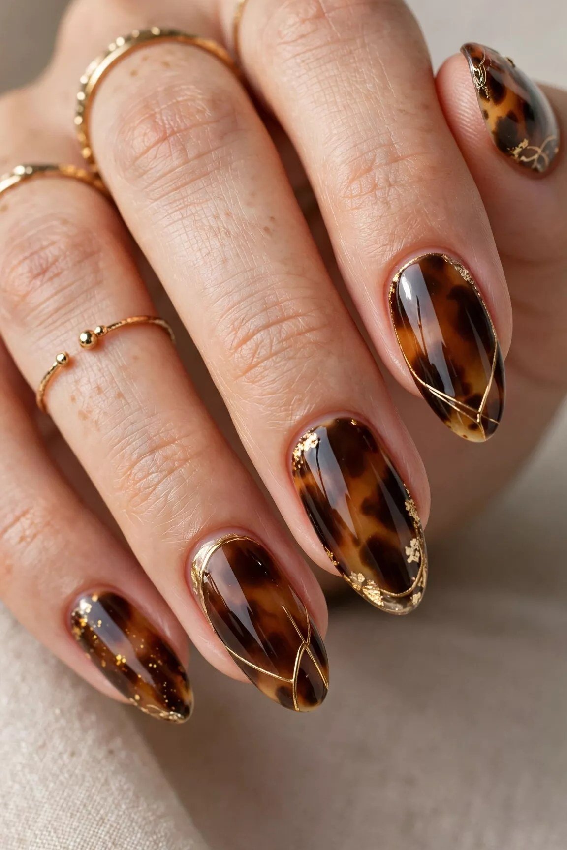 Tortoiseshell nail design: Chocolate Tortoise with Gold Lines for women over 50
