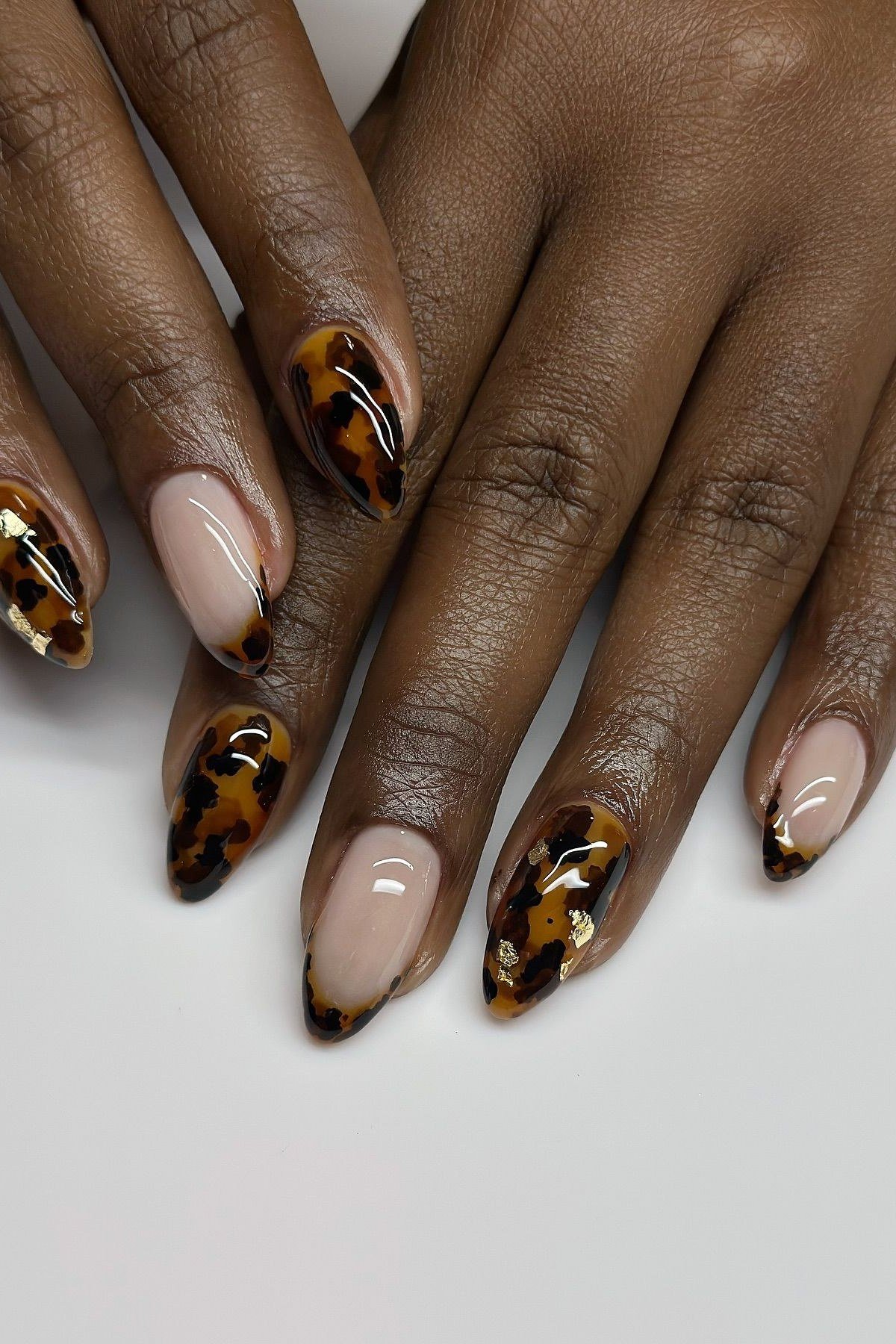 Tortoiseshell nail design: Tortoise on Deep Skin with Nude for women over 50