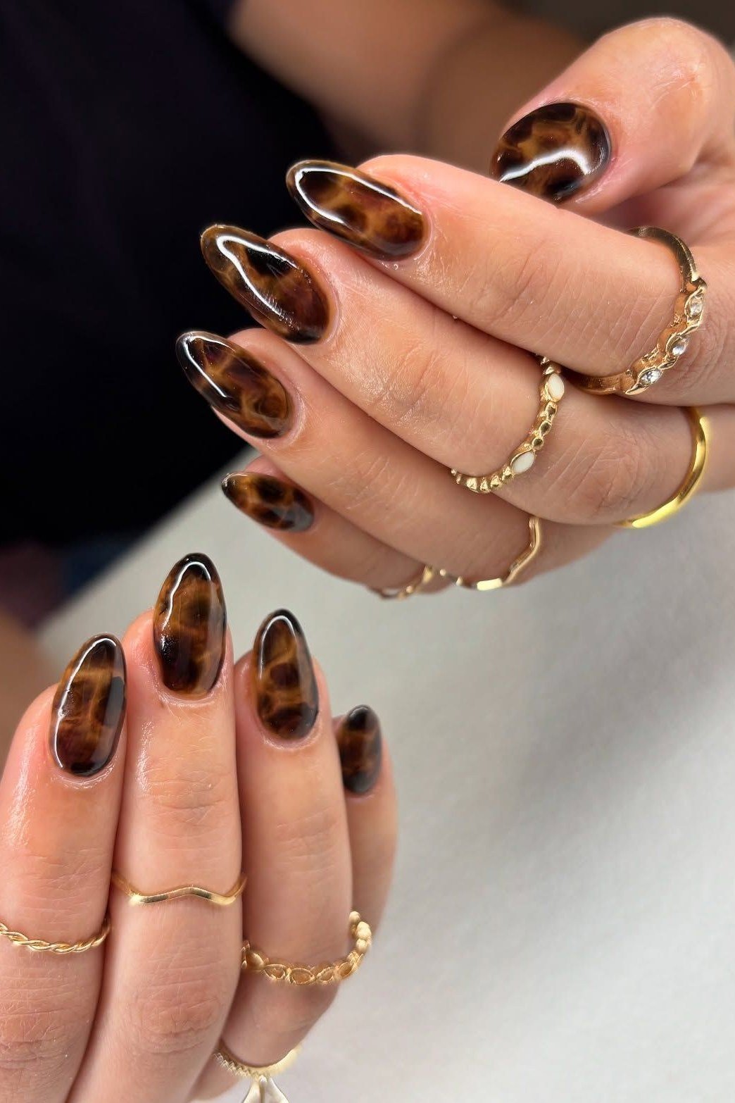 Tortoiseshell nail design: Long Almond Tortoise with Nude for women over 50