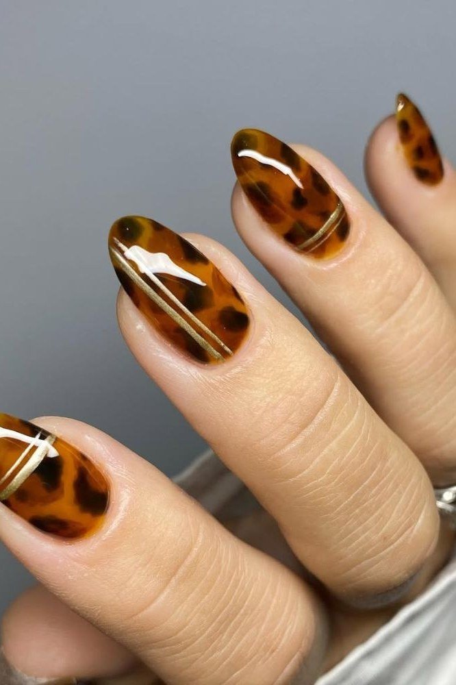 Tortoiseshell nail design: Tortoise with a Gold Stripe for women over 50