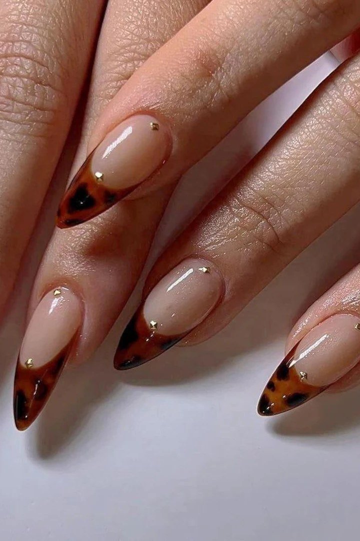 Tortoiseshell nail design: Long Almond Tortoise Tips for women over 50