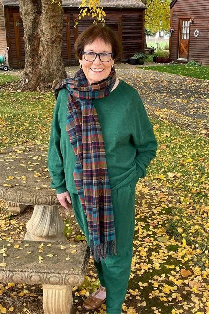 Emerald-Green Jumpsuit with Plaid Scarf, travel outfit for women over 70