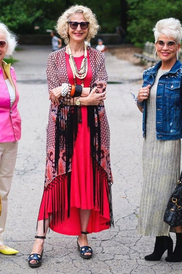 Three women in colorful daytime outfits together - trendy outfits for women over 70