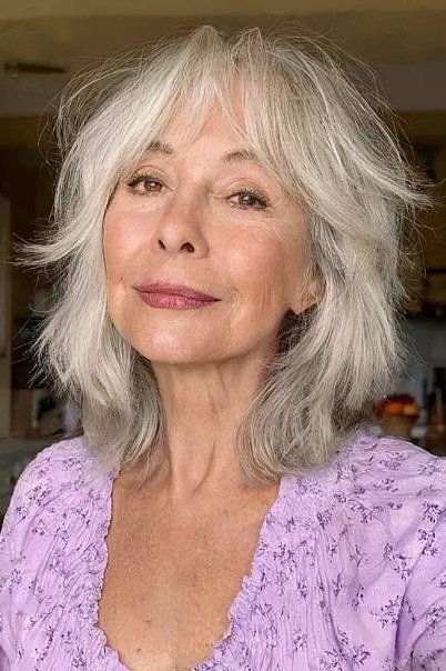 Soft Wavy White Shaggy Bob - textured shaggy bob hairstyle for women over 60