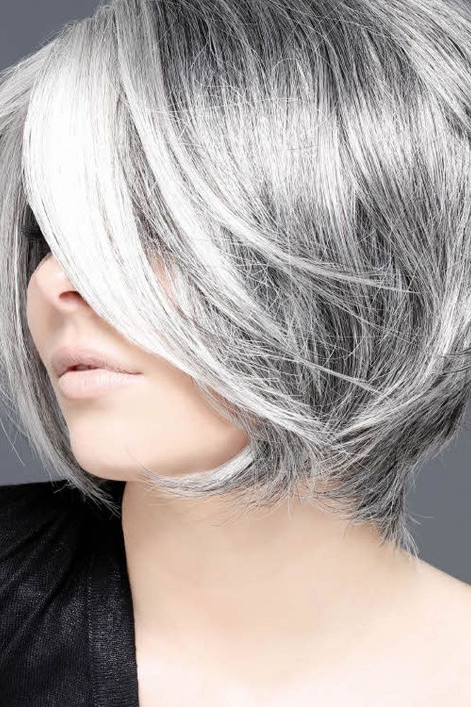 Sleek Platinum Shaggy Bob - textured shaggy bob hairstyle for women over 60