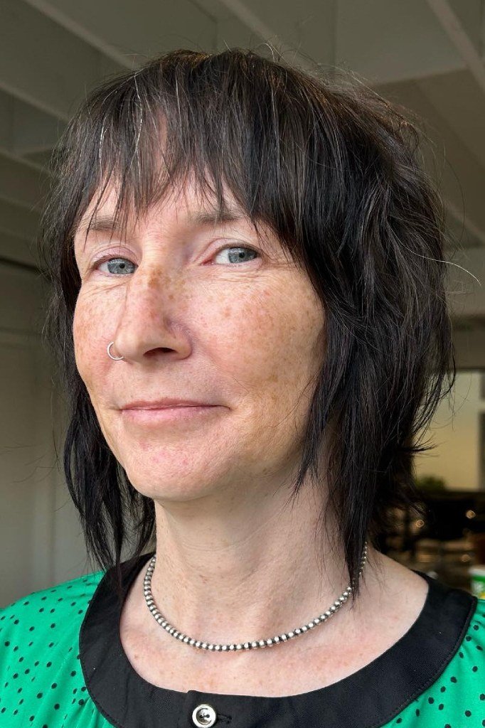 Jet Black Textured Shaggy Bob - textured shaggy bob hairstyle for women over 60