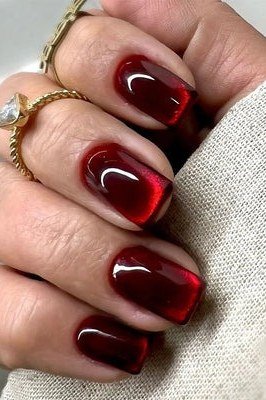 Deep red cat eye, short square, glossy - nail ideas for women over 40