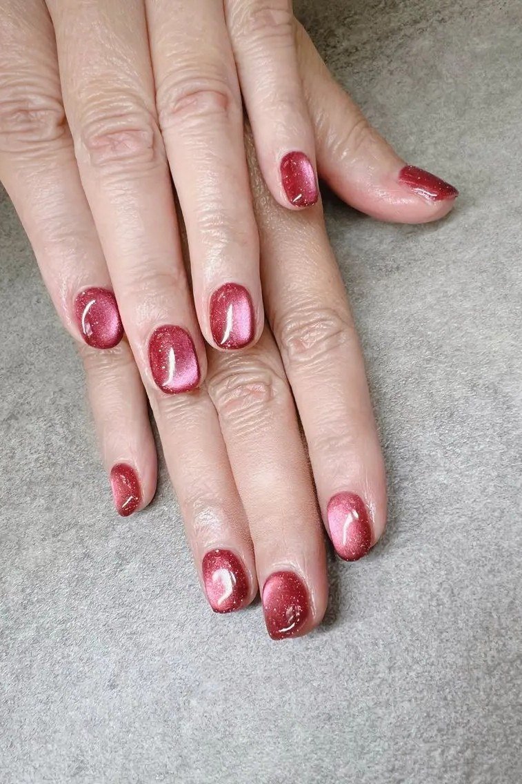 Red burgundy cat eye, short almond - nail ideas for women over 40