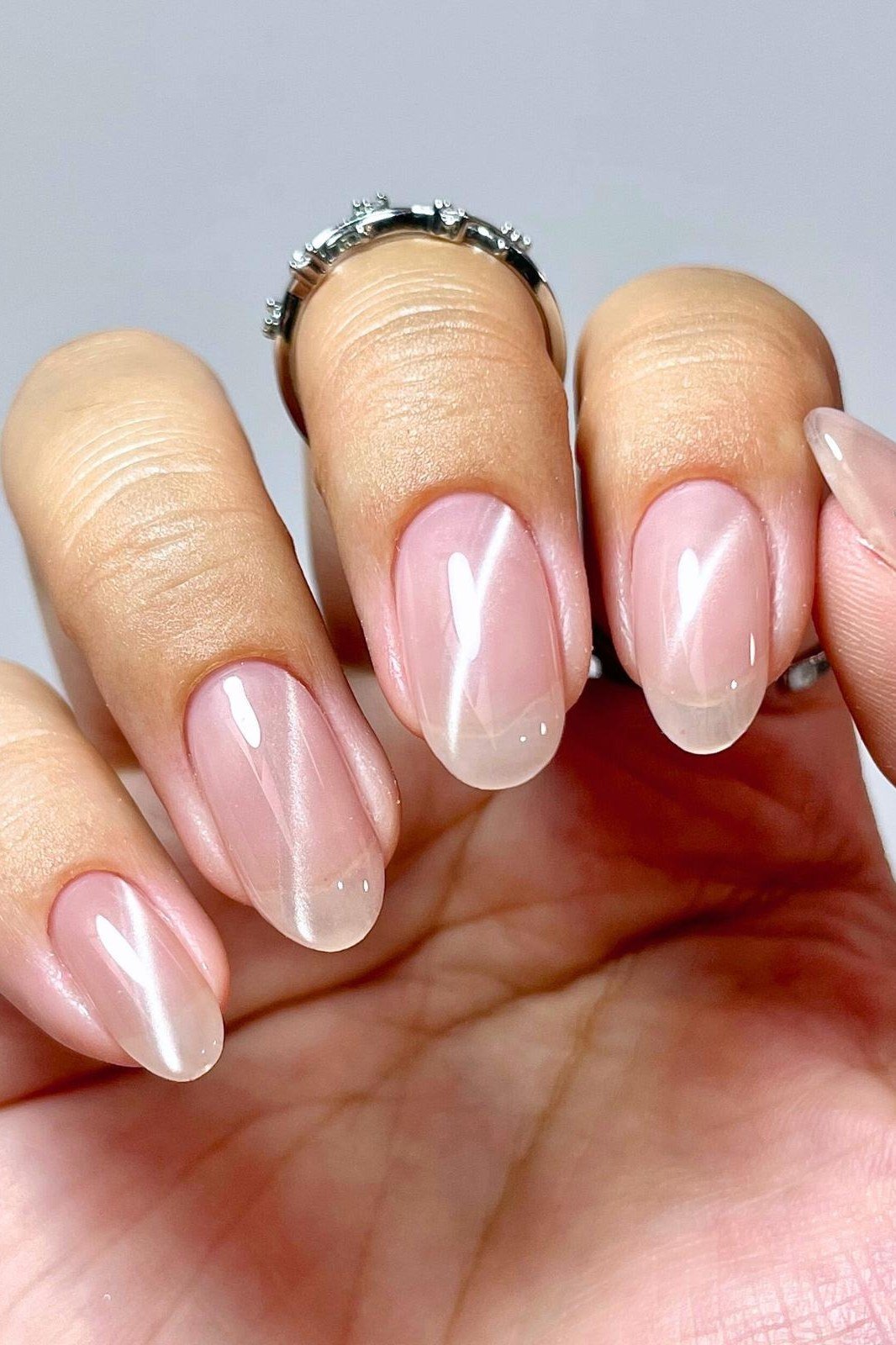 Soft pink velvet cat eye, oval - nail ideas for women over 40