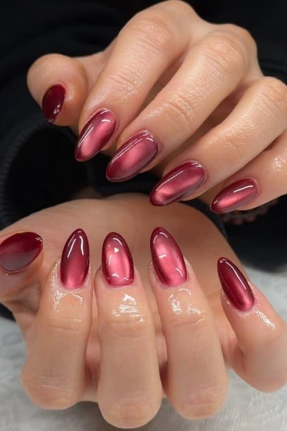 Magenta pink velvet cat eye, oval - nail ideas for women over 40