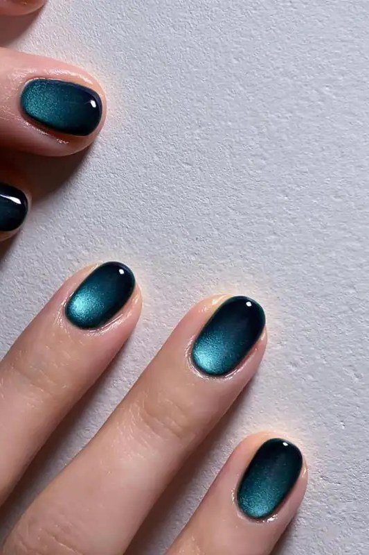 Navy velvet cat eye, short oval - nail ideas for women over 40