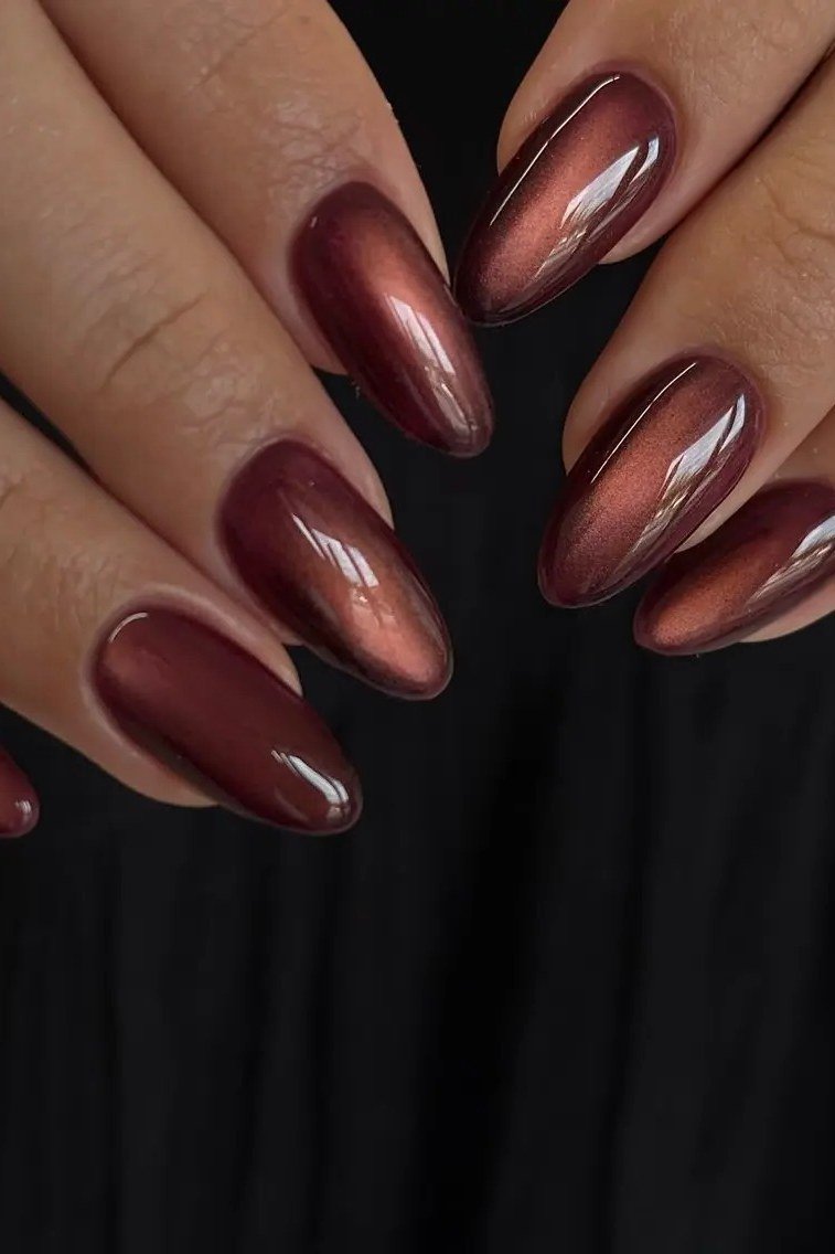Burgundy black cherry velvet cat eye, almond - nail ideas for women over 40