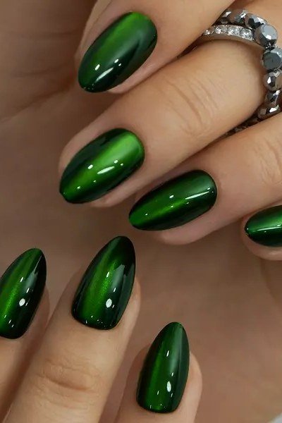 Emerald velvet almond, glossy deep green - nail ideas for women over 40