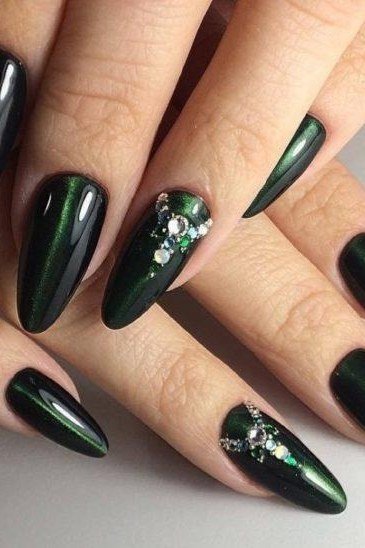 Black emerald velvet stiletto, sleek dark green - nail ideas for women over 40