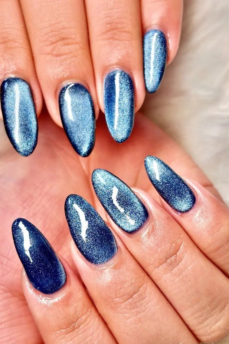 Steel blue cat eye almond, luminous magnetic line - nail ideas for women over 40