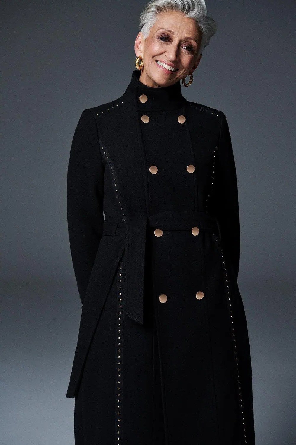 Winter outfit idea 24 for women over 60: black double-breasted long wool coat