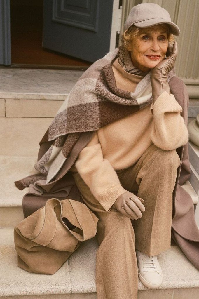 Winter outfit idea 31 for women over 60: camel monochrome outfit with shawl and cap, steps