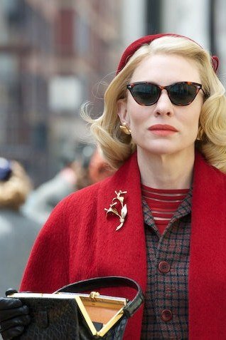Winter outfit idea 59 for women over 60: red coat with red beret, street