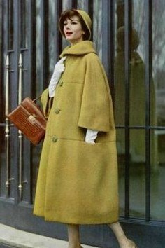 Winter outfit idea 66 for women over 60: mustard chartreuse coat, street