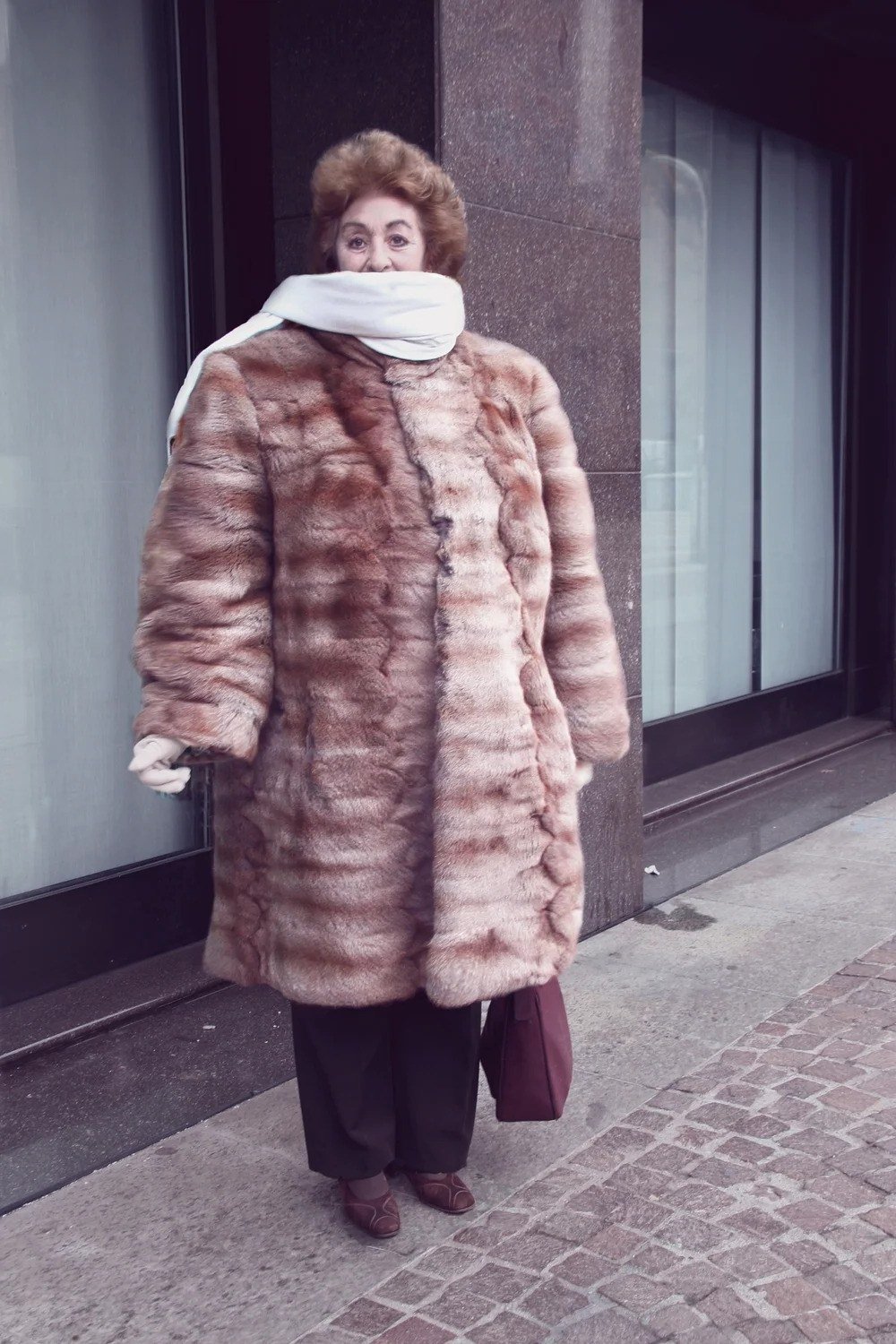 Winter outfit idea 67 for women over 60: pink mink coat, street
