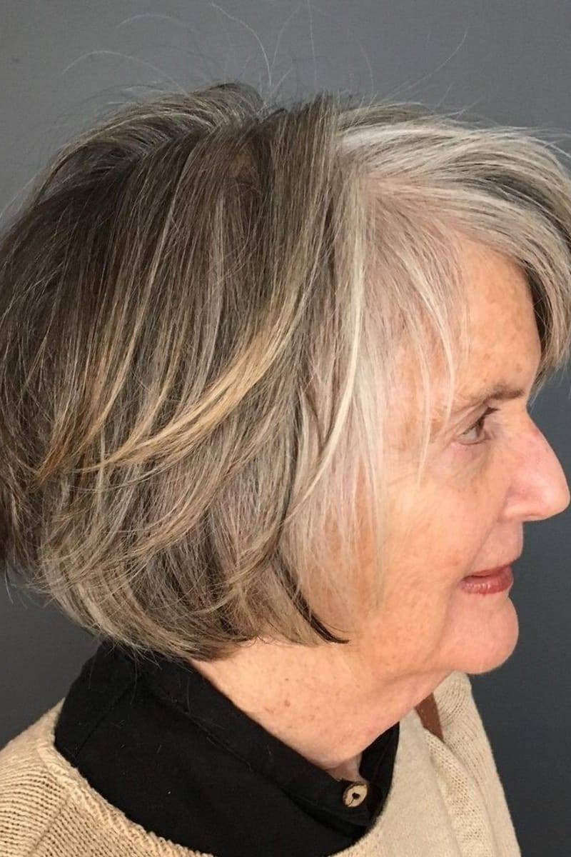 Silver layered bob, side view, mature - voluminous layered bob hairstyle for women over 50