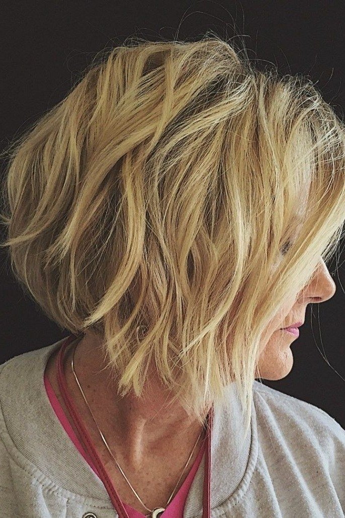 Blonde layered bob, side view, mature - voluminous layered bob hairstyle for women over 50