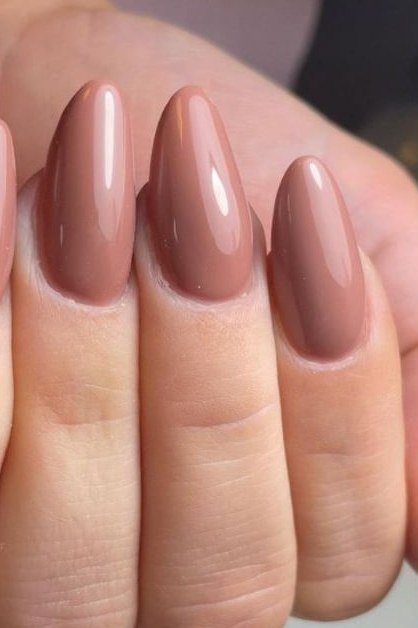 Warm brown nude medium almond nails for women over 50