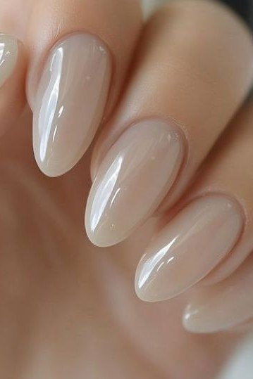 Milky white nude almond nails for women over 50