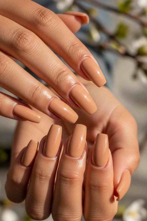 Warm nude medium almond nails for women over 50