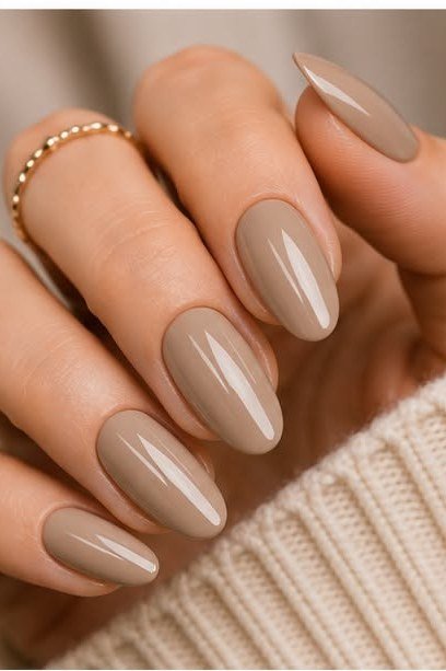 Warm taupe nude almond nails for women over 50