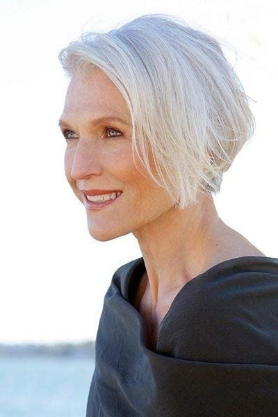 White layered pixie-bob, side view, navy top - wash and wear haircut for women over 60