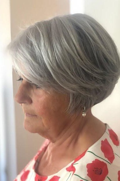Silver stacked bob, side view, floral top - wash and wear haircut for women over 60