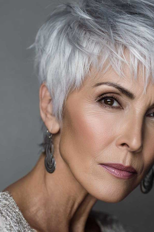 Silver pixie, side view, dark background - wash and wear haircut for women over 60