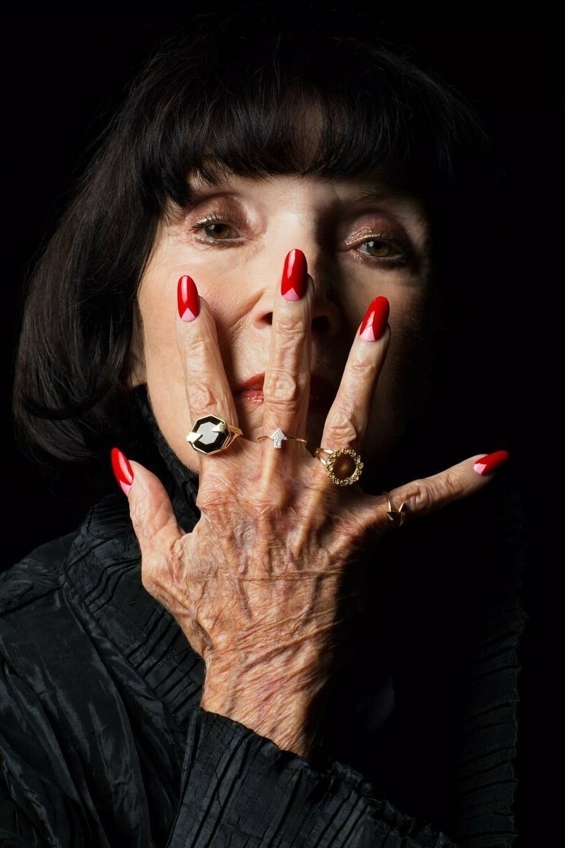 Confident Red in a Bold Portrait, winter nail color idea for women over 60