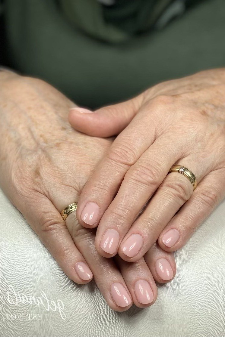 Sheer Nude-Pink on Aged Hands, winter nail color idea for women over 60