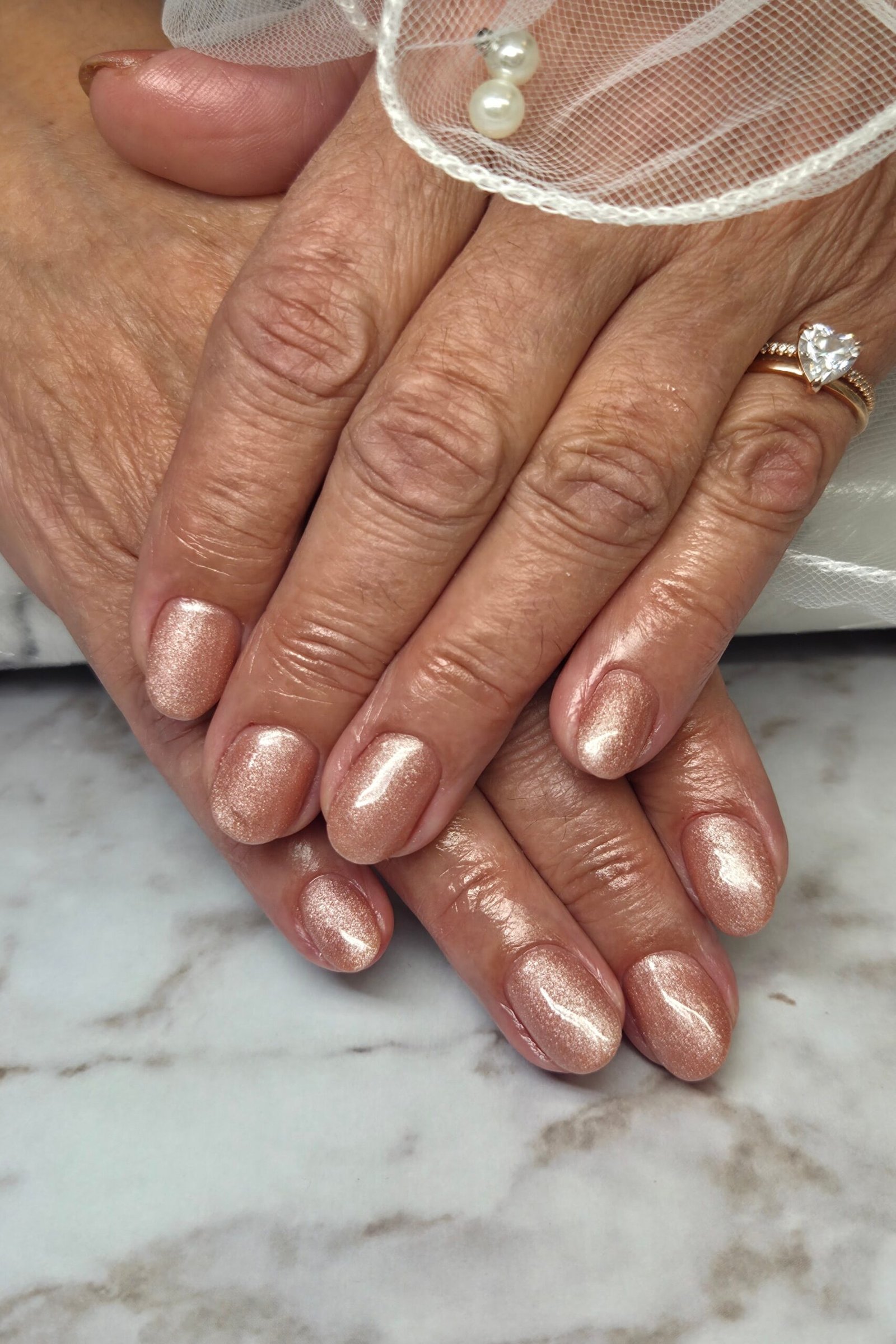 Mauve with Snowflake Art, winter nail color idea for women over 60