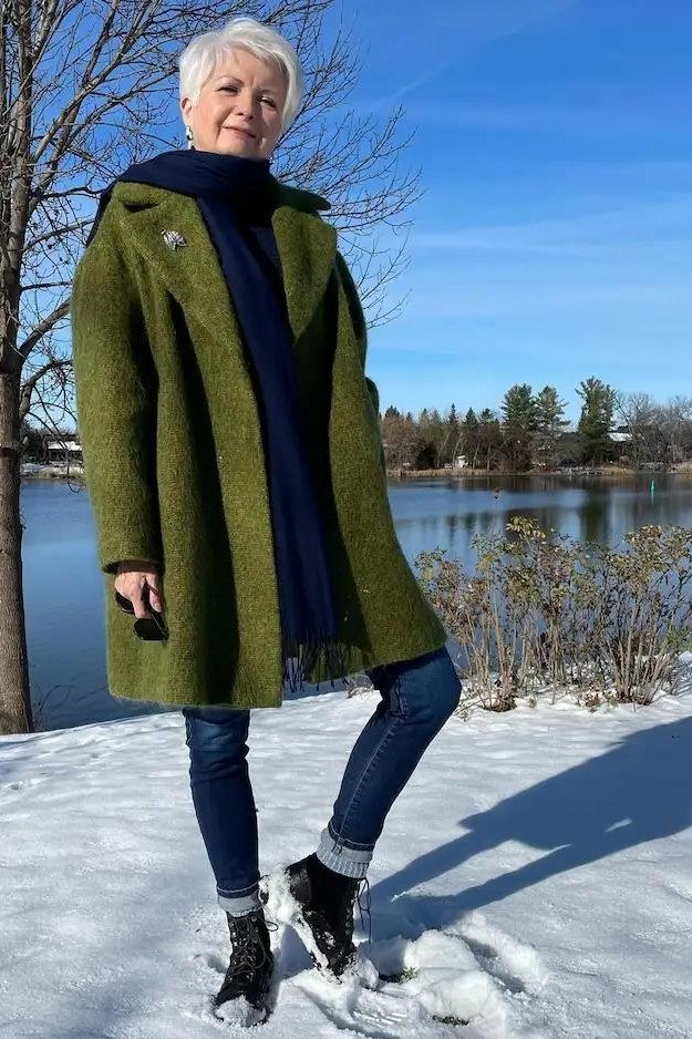 Olive Green Coat with a Navy Scarf at the Lake - winter coat outfit for women over 60