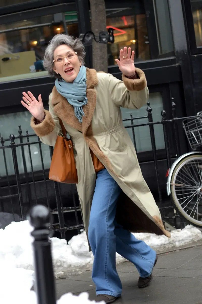 Tan Trench Coat with a Blue Scarf and Jeans - winter coat outfit for women over 60