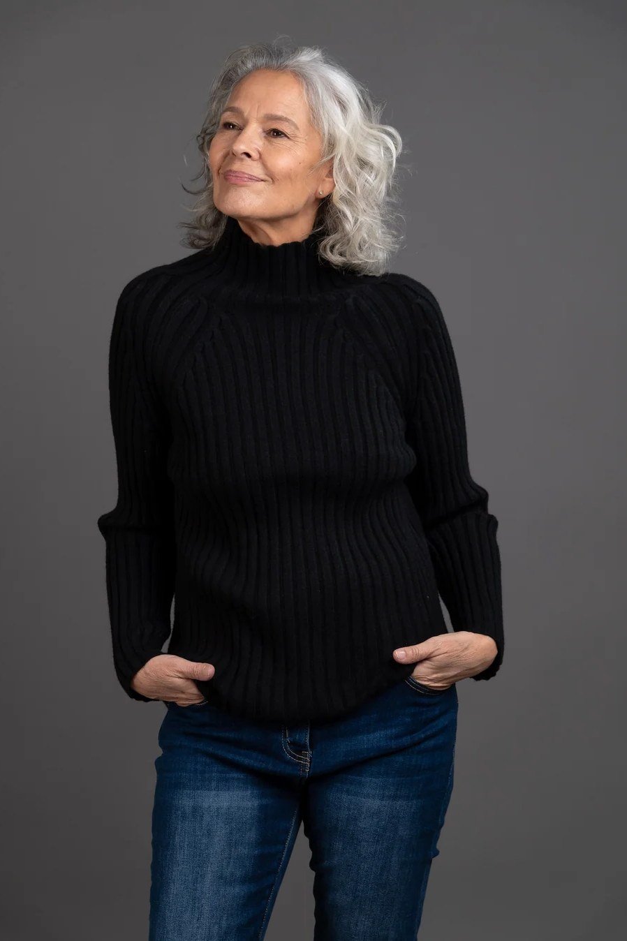 Black Ribbed Turtleneck with Jeans on a woman over 60, cozy winter casual outfit idea 9