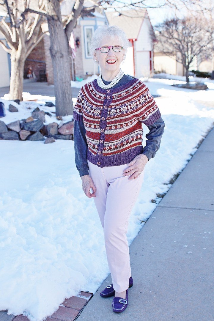 Red Fair-Isle Sweater with White Jeans on a woman over 60, cozy winter casual outfit idea 11