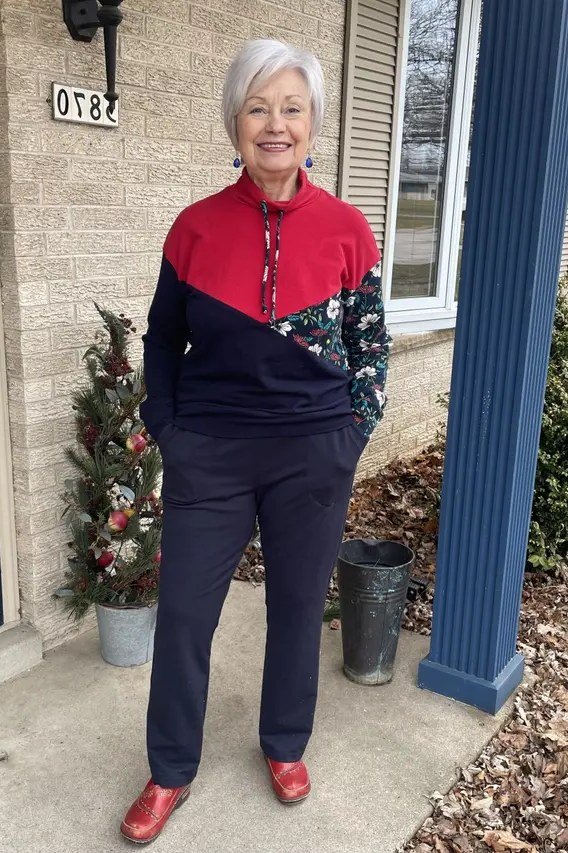 Red and Navy Colorblock Track Jacket with Navy Pants on a woman over 60, cozy winter casual outfit idea 14